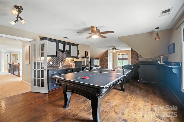 5916 Four Wood Dr, Matthews, NC 28104 - rec room with a ceiling fan and dark wood-style flooring