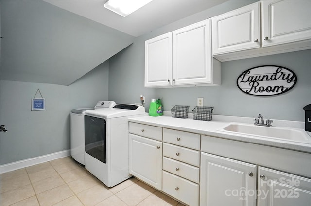5916 Four Wood Dr, Matthews, NC 28104 - laundry room with cabinet space, washer and dryer, and light tile patterned floors