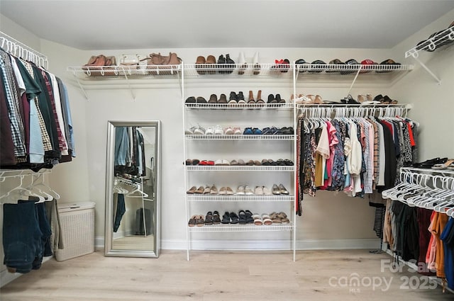 5916 Four Wood Dr, Matthews, NC 28104 - spacious closet with wood finished floors