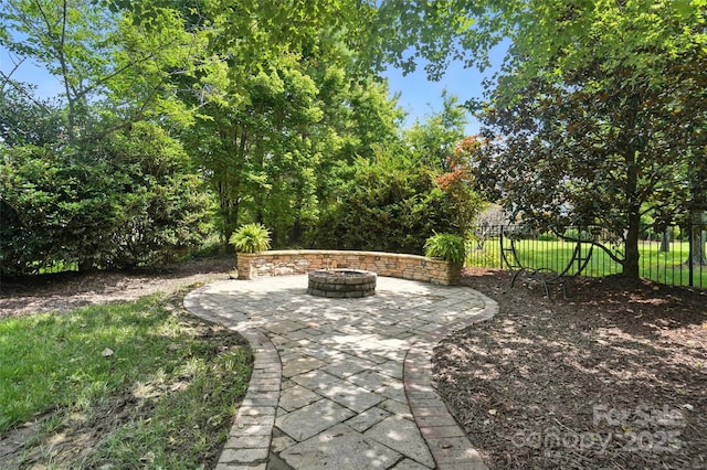 5916 Four Wood Dr, Matthews, NC 28104 - view of patio featuring a fire pit