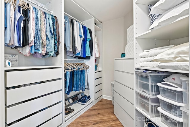 1038 SW Dr, Davidson, NC 28036 - spacious closet with wood finished floors