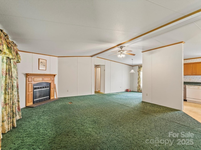 4591 Scott Rd, Morganton, NC 28655 - unfurnished living room with a ceiling fan, a glass covered fireplace, ornamental molding, carpet flooring, and lofted ceiling