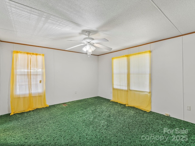 4591 Scott Rd, Morganton, NC 28655 - carpeted empty room with ornamental molding and ceiling fan