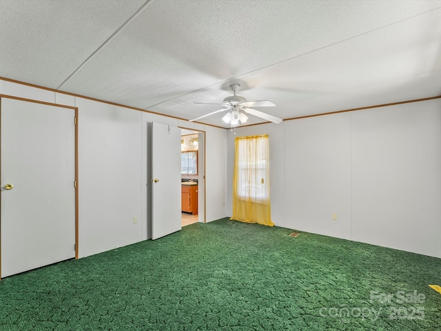 4591 Scott Rd, Morganton, NC 28655 - unfurnished bedroom featuring carpet floors, a ceiling fan, a textured ceiling, and connected bathroom