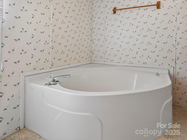 4591 Scott Rd, Morganton, NC 28655 - bathroom featuring a garden tub and tile patterned floors