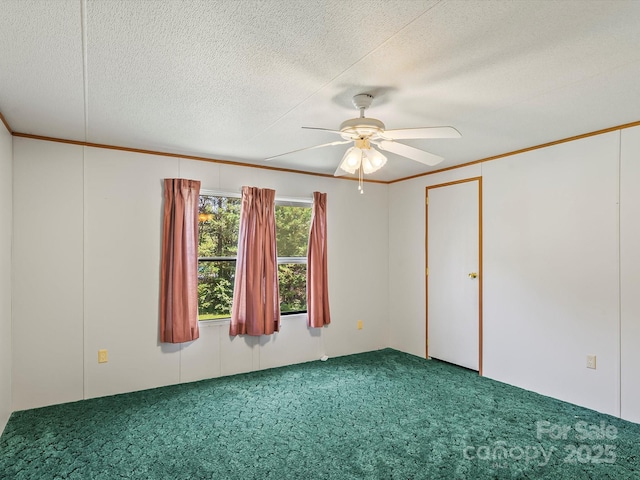 4591 Scott Rd, Morganton, NC 28655 - unfurnished room featuring carpet floors, ceiling fan, a textured ceiling, and ornamental molding