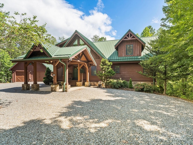 1526 Pisgah Preserve Dr Unit 7-8, Nebo, NC 28761 - view of front facade featuring driveway, a metal roof, and a standing seam roof