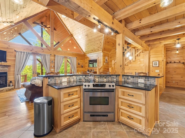 1526 Pisgah Preserve Dr Unit 7-8, Nebo, NC 28761 - kitchen with electric stove, light brown cabinetry, open floor plan, wooden ceiling, and wood walls