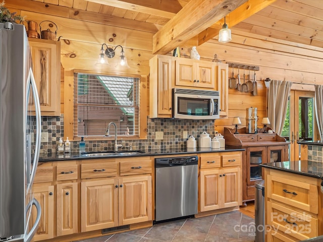 1526 Pisgah Preserve Dr Unit 7-8, Nebo, NC 28761 - kitchen with appliances with stainless steel finishes, backsplash, beamed ceiling, light brown cabinets, and wooden walls