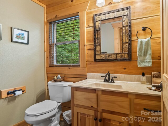 1526 Pisgah Preserve Dr Unit 7-8, Nebo, NC 28761 - bathroom featuring vanity and wood walls