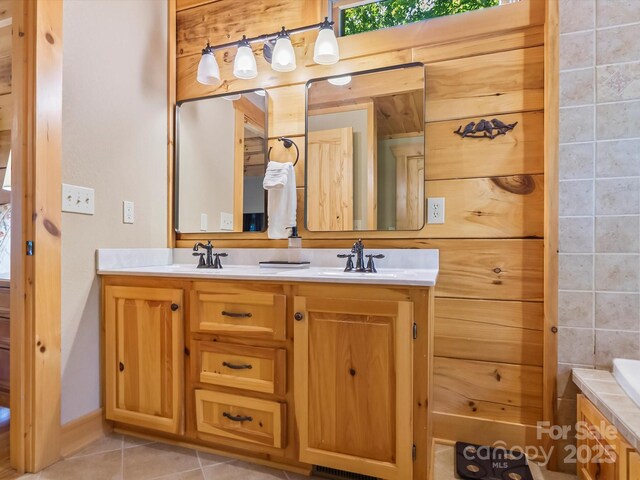 1526 Pisgah Preserve Dr Unit 7-8, Nebo, NC 28761 - bathroom with tile patterned floors, double vanity, and a tub to relax in