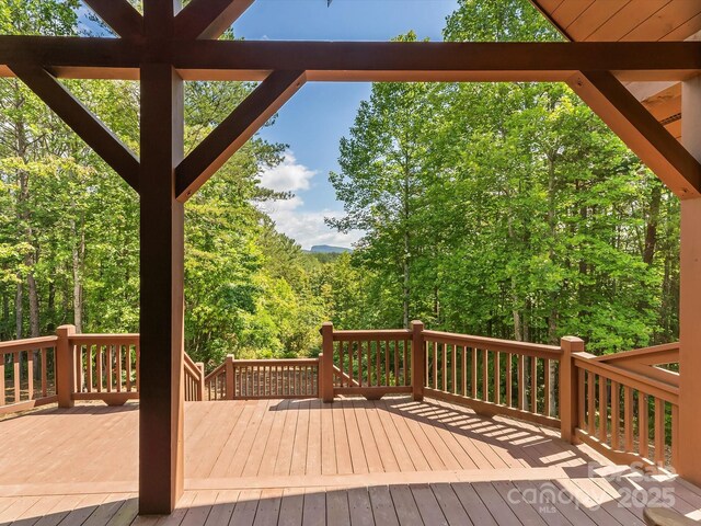 1526 Pisgah Preserve Dr Unit 7-8, Nebo, NC 28761 - deck featuring a wooded view