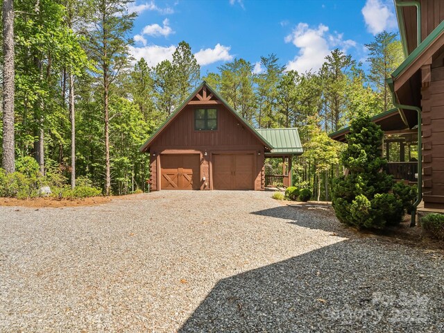 1526 Pisgah Preserve Dr Unit 7-8, Nebo, NC 28761 - garage featuring gravel driveway and a garage