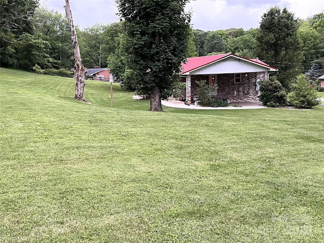 135 Smathers St, Clyde, NC 28721 - view of green lawn with covered porch