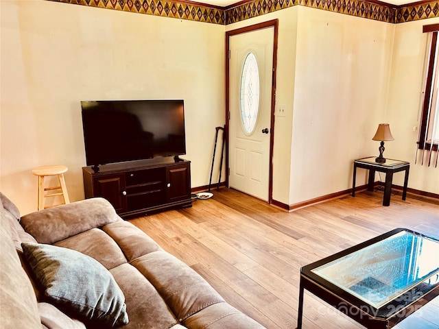 135 Smathers St, Clyde, NC 28721 - living area with wood finished floors and baseboards