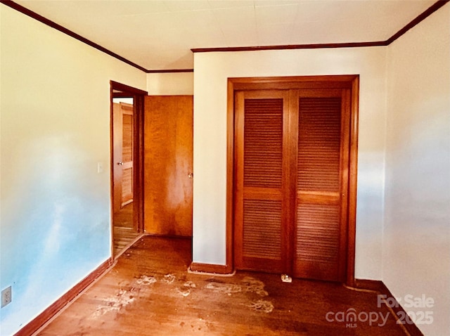 135 Smathers St, Clyde, NC 28721 - corridor with wood finished floors, baseboards, and crown molding