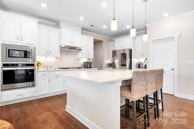 16324 Loch Raven Rd, Huntersville, NC 28078 - kitchen with stainless steel appliances, dark wood-type flooring, backsplash, crown molding, and light countertops