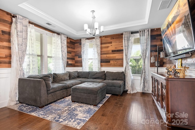 16324 Loch Raven Rd, Huntersville, NC 28078 - living room with a raised ceiling, a chandelier, crown molding, dark wood finished floors, and wooden walls