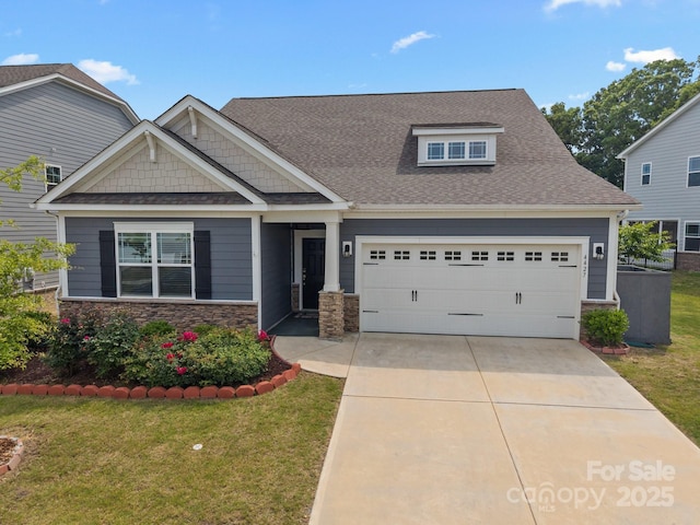 4427 Poplin Grove Dr, Indian Trail, NC 28079 - craftsman inspired home with a front lawn, driveway, a shingled roof, and stone siding