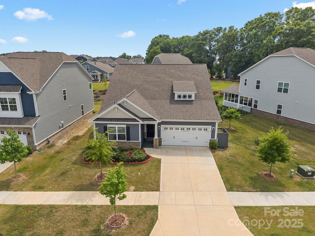 4427 Poplin Grove Dr, Indian Trail, NC 28079 - view of front of house featuring concrete driveway, a residential view, a shingled roof, a front lawn, and a garage