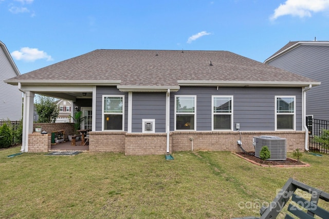4427 Poplin Grove Dr, Indian Trail, NC 28079 - back of house with central AC unit, brick siding, a patio, and roof with shingles