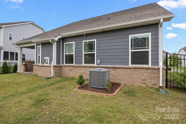 4427 Poplin Grove Dr, Indian Trail, NC 28079 - back of house featuring central AC unit and roof with shingles