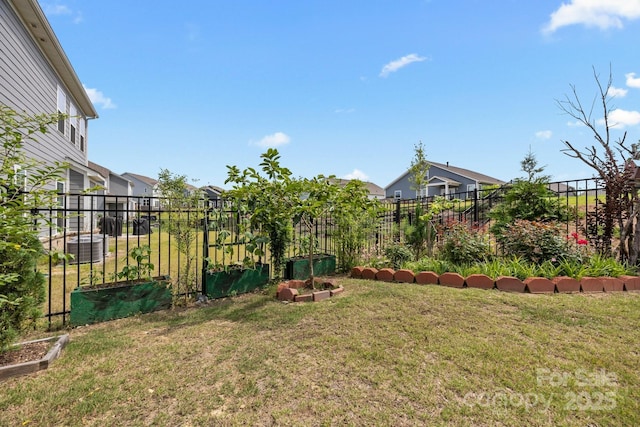 4427 Poplin Grove Dr, Indian Trail, NC 28079 - view of yard with a garden and a residential view