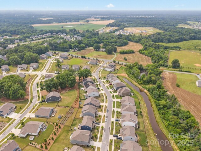 4427 Poplin Grove Dr, Indian Trail, NC 28079 - aerial view of property's location with nearby suburban area