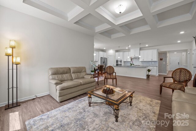 4427 Poplin Grove Dr, Indian Trail, NC 28079 - living area featuring wood finished floors, beamed ceiling, ornamental molding, recessed lighting, and coffered ceiling