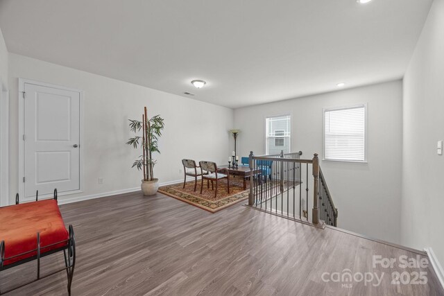 4427 Poplin Grove Dr, Indian Trail, NC 28079 - living area featuring an upstairs landing, wood finished floors, baseboards, and recessed lighting
