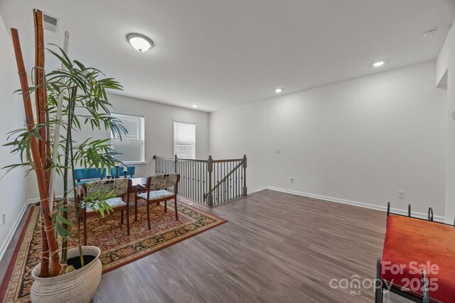 4427 Poplin Grove Dr, Indian Trail, NC 28079 - sitting room with wood finished floors, an upstairs landing, baseboards, and recessed lighting