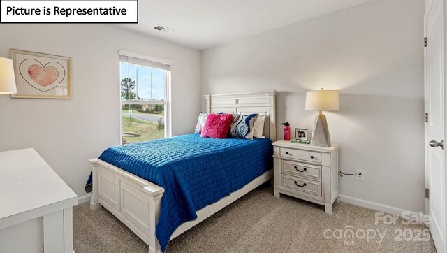 5908 Faron Way, Charlotte, NC 28262 - bedroom with light carpet and baseboards