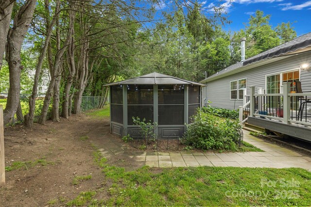 381 US-70 Hwy, Black Mountain, NC 28711 - view of yard with a wooden deck and a sunroom