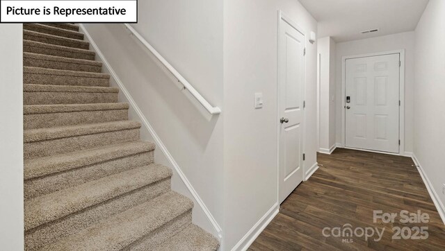 5912 Faron Way, Charlotte, NC 28262 - staircase featuring wood finished floors and baseboards