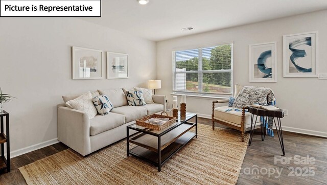 5912 Faron Way, Charlotte, NC 28262 - living area featuring baseboards and wood finished floors