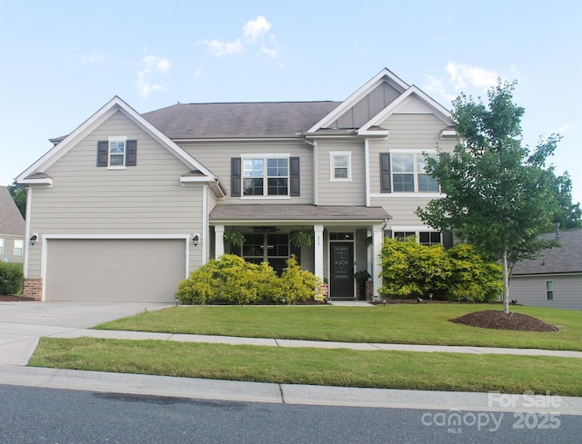 858 Oak Manor Dr SE, Concord, NC 28025 - craftsman house featuring a front lawn, driveway, and a garage