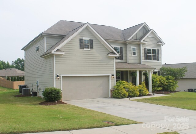 858 Oak Manor Dr SE, Concord, NC 28025 - view of front of property with concrete driveway and an attached garage