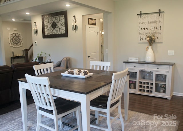 858 Oak Manor Dr SE, Concord, NC 28025 - dining room featuring wood finished floors, recessed lighting, and stairway