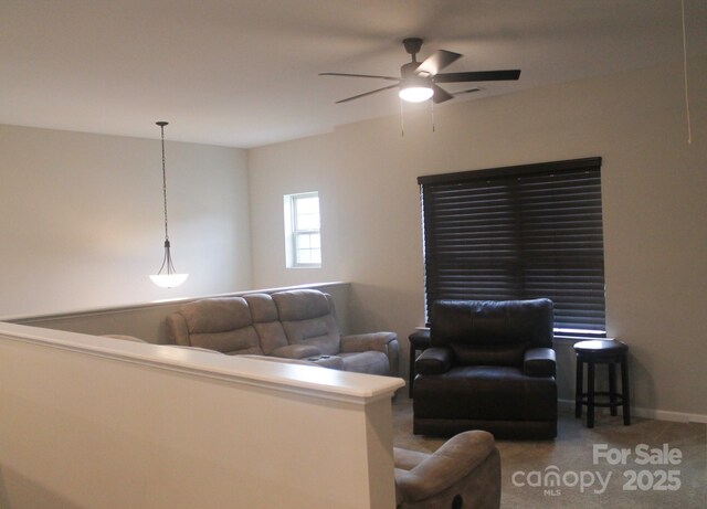 858 Oak Manor Dr SE, Concord, NC 28025 - living area featuring a ceiling fan and carpet floors