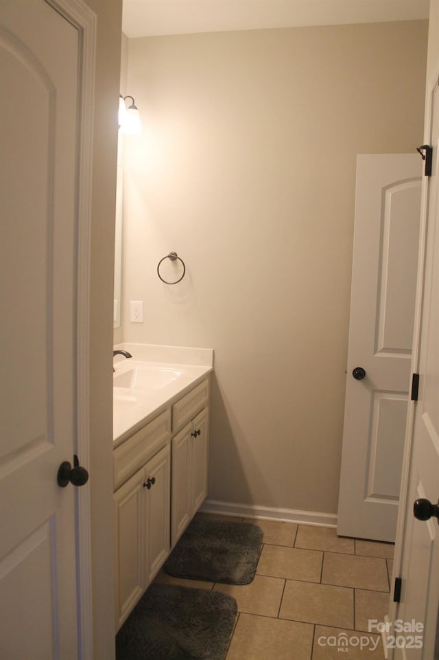 858 Oak Manor Dr SE, Concord, NC 28025 - bathroom with vanity and tile patterned flooring