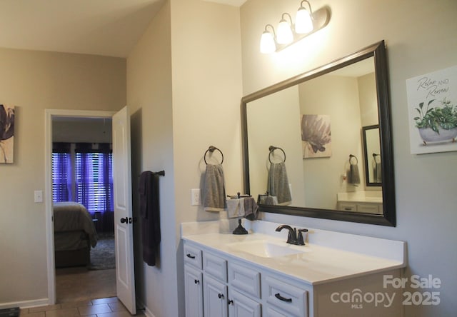 858 Oak Manor Dr SE, Concord, NC 28025 - ensuite bathroom with vanity and tile patterned flooring