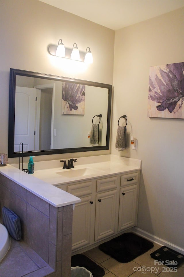 858 Oak Manor Dr SE, Concord, NC 28025 - bathroom with tile patterned flooring and vanity
