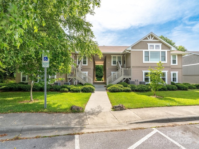 91 Morningside Ln, Hendersonville, NC 28792 - view of front of property with stairs and a front lawn