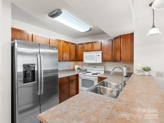 91 Morningside Ln, Hendersonville, NC 28792 - kitchen featuring white appliances, light countertops, brown cabinets, pendant lighting, and a textured ceiling