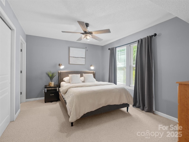 91 Morningside Ln, Hendersonville, NC 28792 - bedroom with light colored carpet, a textured ceiling, and ceiling fan