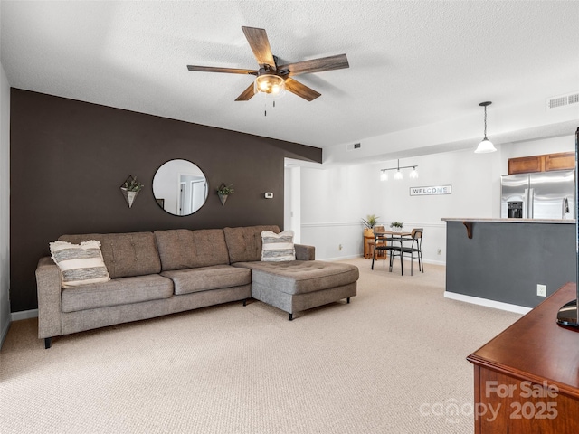 91 Morningside Ln, Hendersonville, NC 28792 - living room with light carpet, ceiling fan, and a textured ceiling
