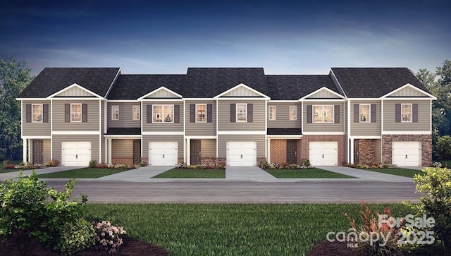 5110 Hyrule Dr, Charlotte, NC 28262 - view of property with an attached garage and a shingled roof