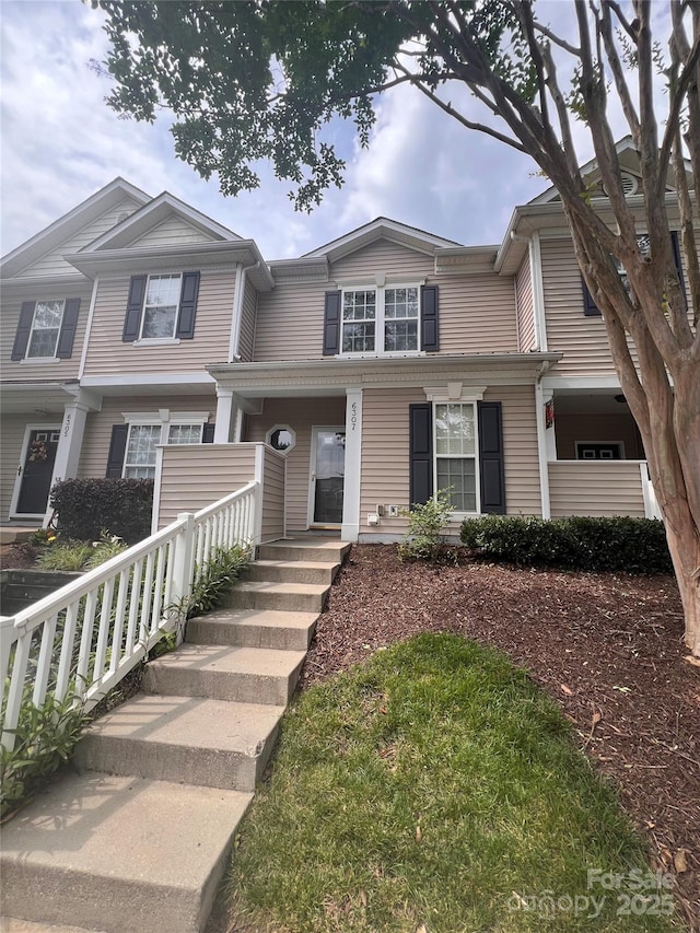 6307 Rhodins Ln, Fort Mill, SC 29707 - townhome / multi-family property with covered porch