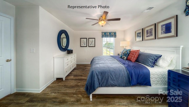 1342 37th Avenue Ln NE, Hickory, NC 28601 - bedroom with baseboards, wood finished floors, and a ceiling fan