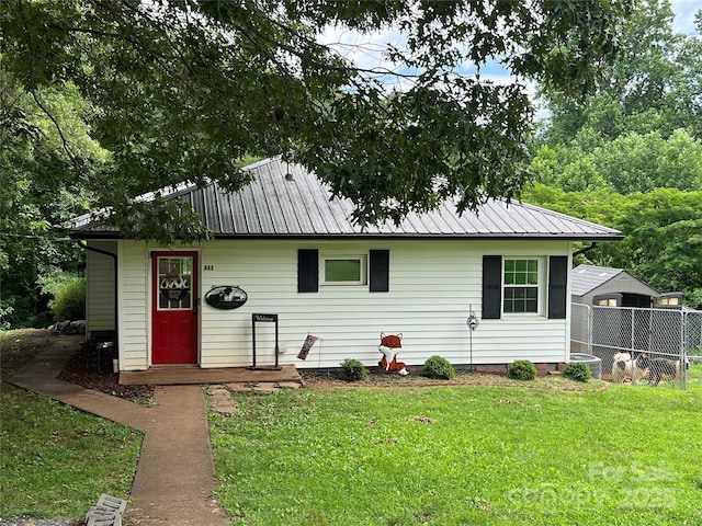 340 Cherry Mountain St, Forest City, NC 28043 - view of front of home with metal roof and cooling unit
